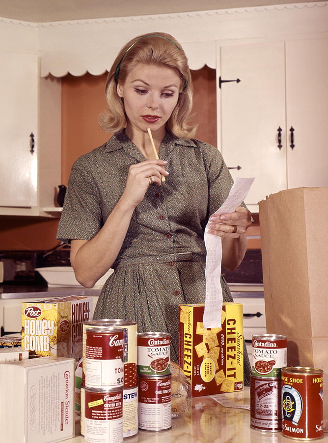 Blonde Woman Housewife In Kitchen Compare Cash Reg Photograph by H. Armstrong Roberts