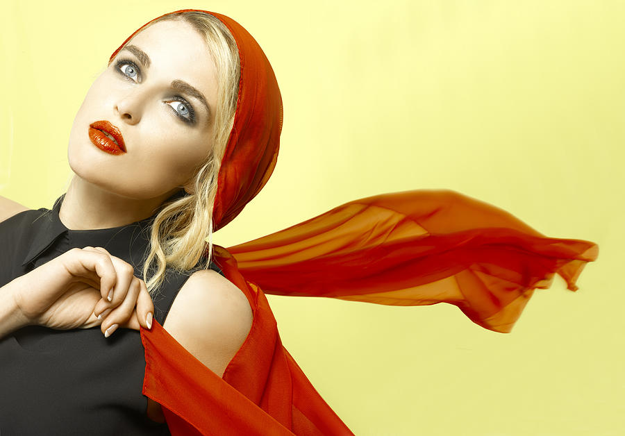 Blonde Woman With Red Lips And Scarf On Yellow Photograph by Riccardo Bianchi