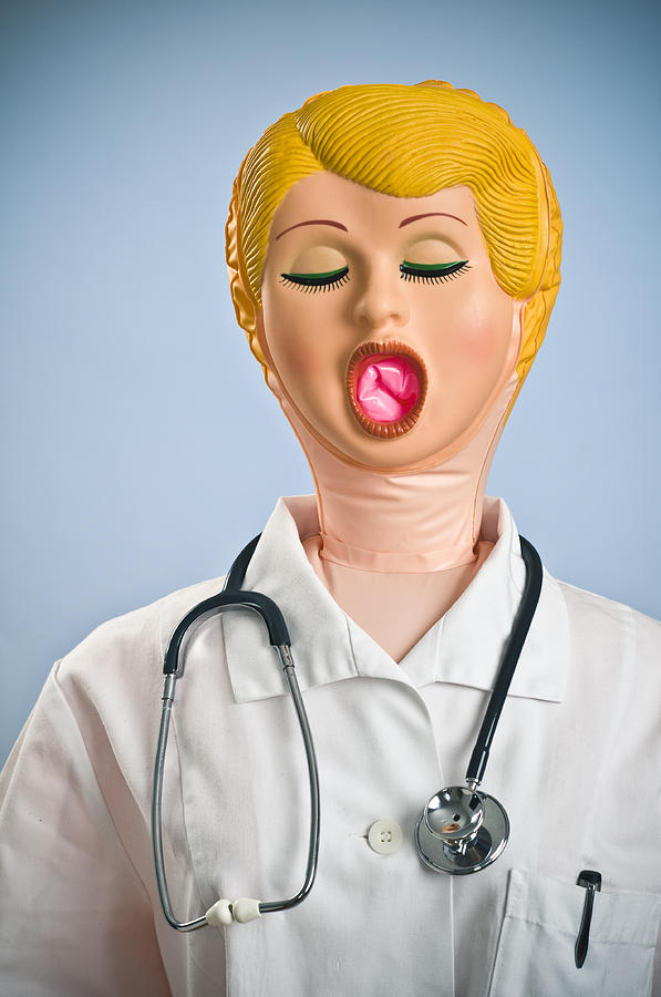 Blow-up Doll Dressed as Doctor with Stethoscope Photograph by Ferrantraite