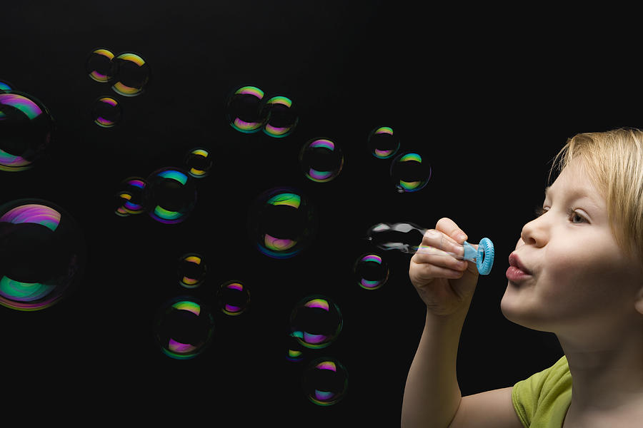 Blowing bubbles Photograph by mrPliskin