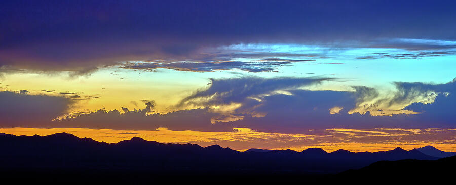 Blue and Gold Sunset over Tucson Mountains Photograph by Chris Anson