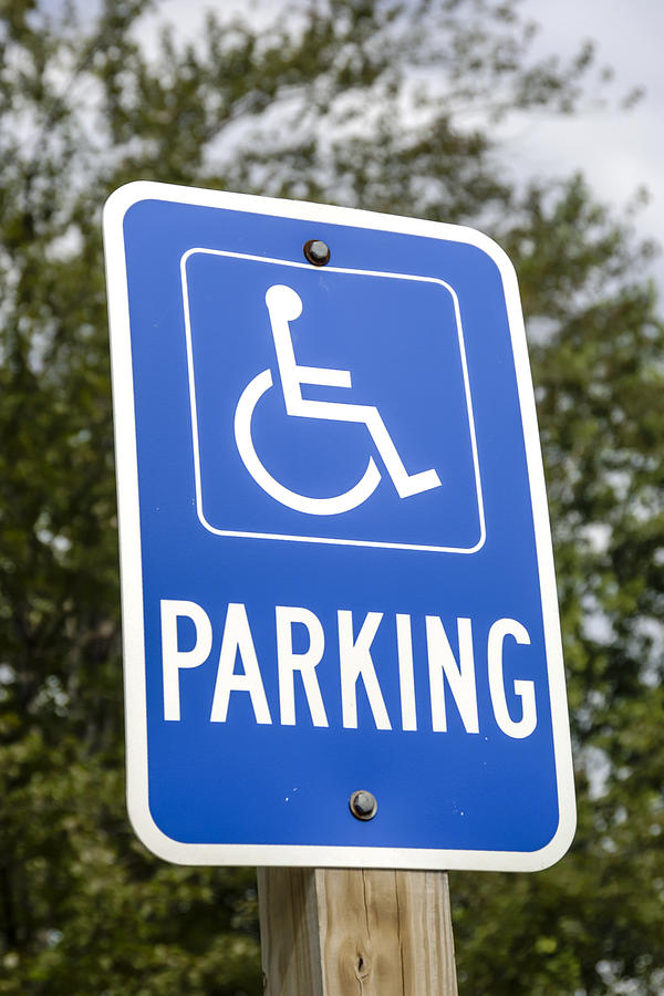 Blue and white Handicapped Parking sign Photograph by Csfotoimages