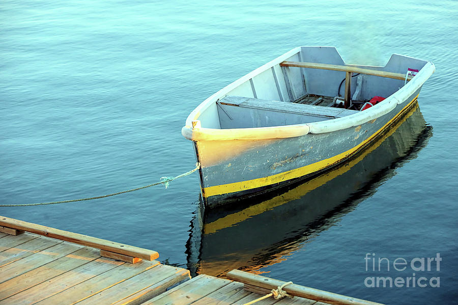 Blue and yellow skiff Photograph by Janice Drew
