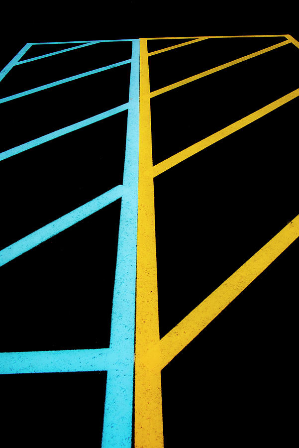 Blue And Yellow Traffic Lines Meet Along The Boarder Photograph