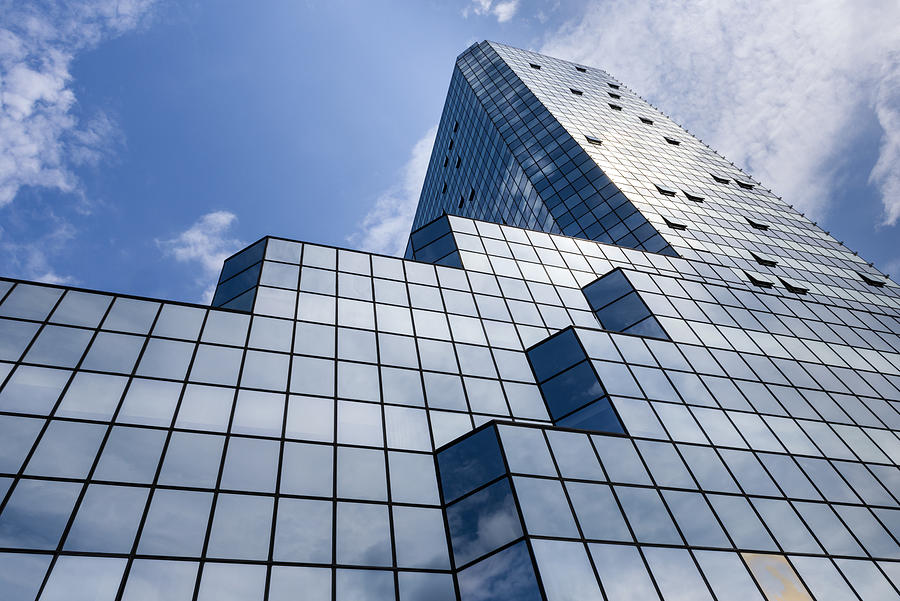 Blue background of glass high rise building Photograph by Jacek Kadaj