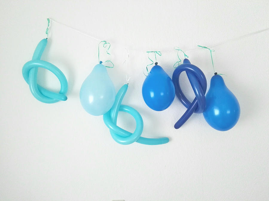 Blue balloons on the wall Photograph by Bella Auslander / FOAP