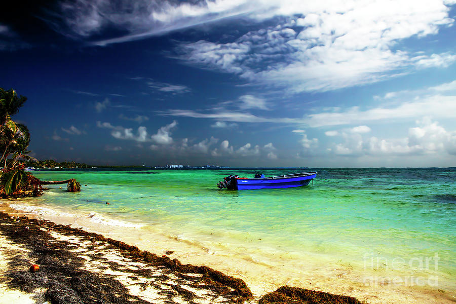 Blue Boat in the Caribbean at San Andres Island Photograph by John Rizzuto