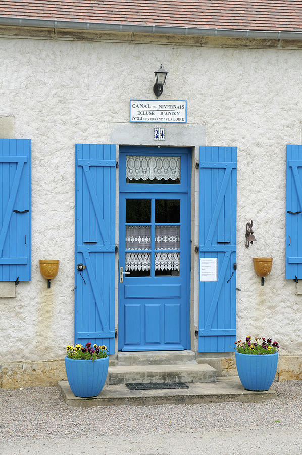 Blue door and shutters at the lock keepers house, Ecluse 24 Anizy, Champ du Pont, Limanton, Nievre, Burgundy, France Photograph by Kevin Oke