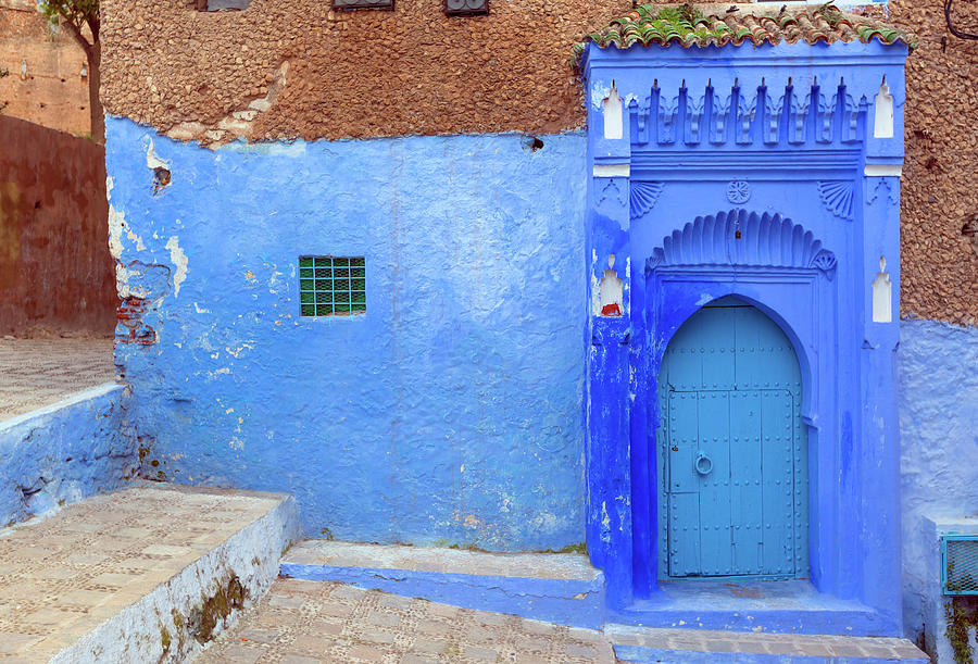 Blue door on street in Chefchaouen Photograph by Mikhail Kokhanchikov