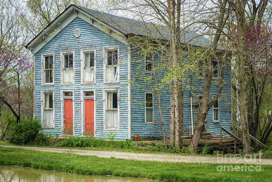 Blue House on Whitewater Canal -   Metamora - Indiana  Photograph by Gary Whitton