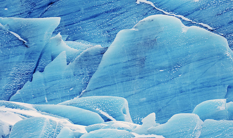 Blue ice of Svinafell glacier in southeast Iceland Photograph by Brytta