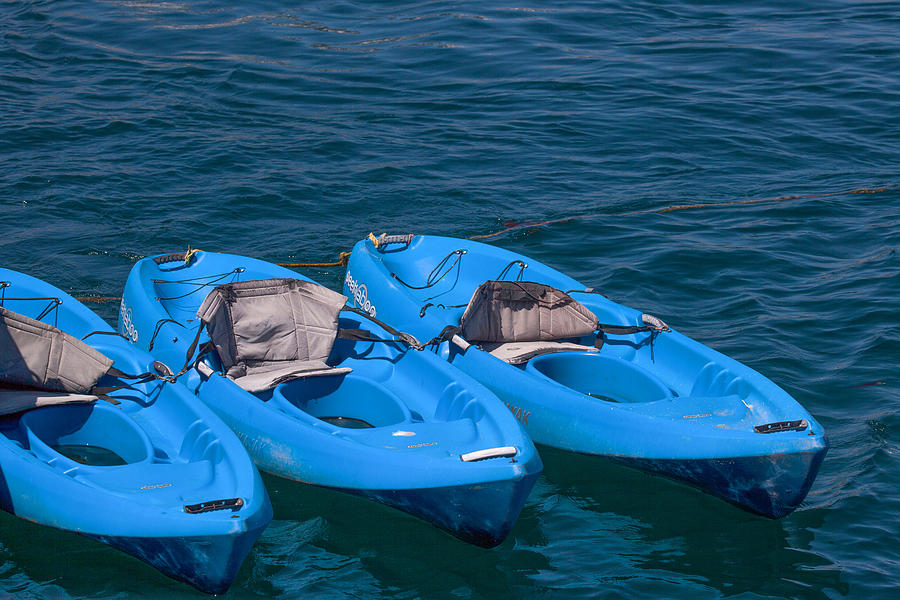Blue Kayaks Photograph by Art Block Collections