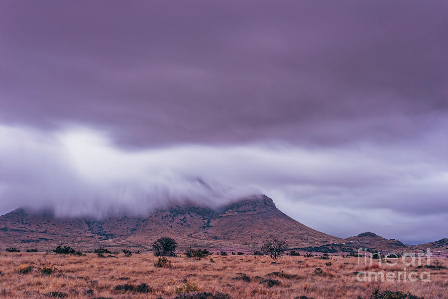 Blue Mountain Shrouded in Cloudy Mystery - Davis Mountains - Fort Davis Texas Photograph by Silvio Ligutti