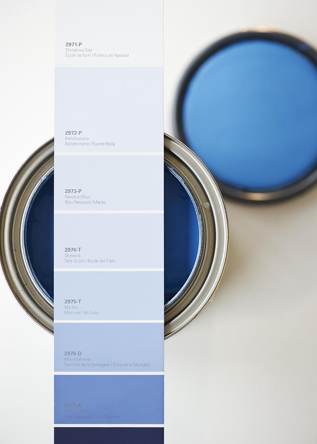Blue paint swatch over corresponding paint can Photograph by Jamie Grill