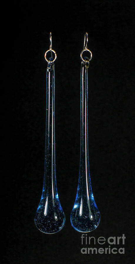Blue Rock crystal teardrop earrings from antique lamps background Photograph by Pablo Avanzini
