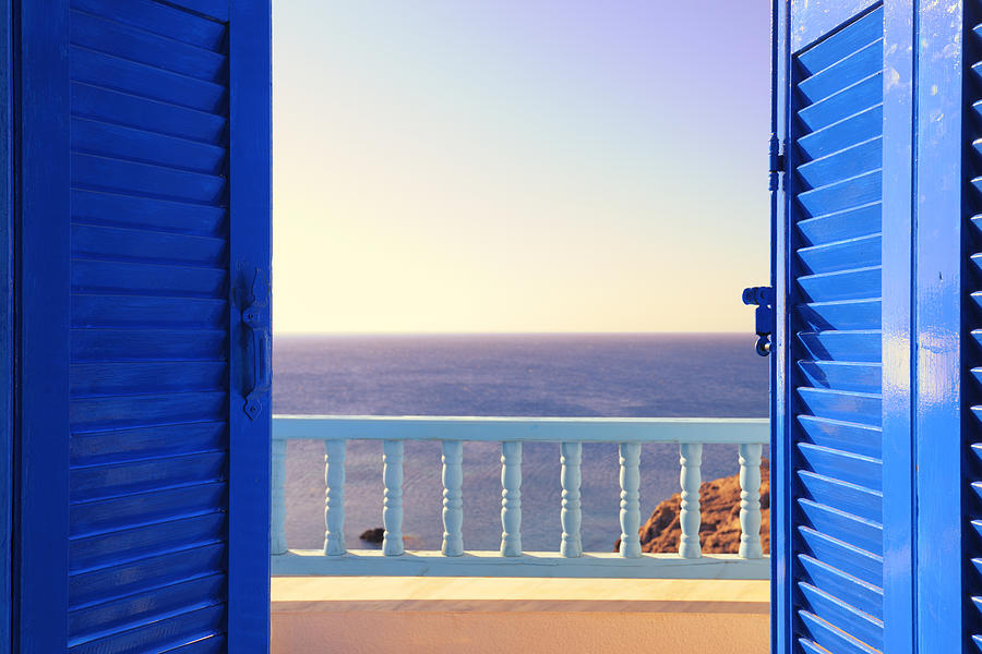 Blue Shutters Open onto Sea and Sky at Dawn Photograph by Ekspansio