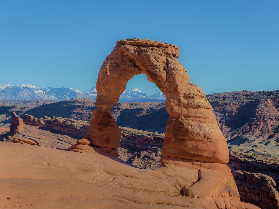 Blue Skies at Delicate Arch Photograph by Joe Kopp