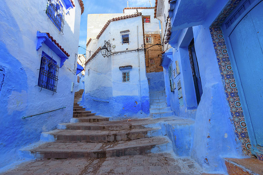 Blue street inside Medina of Chefchaouen Photograph by Mikhail Kokhanchikov