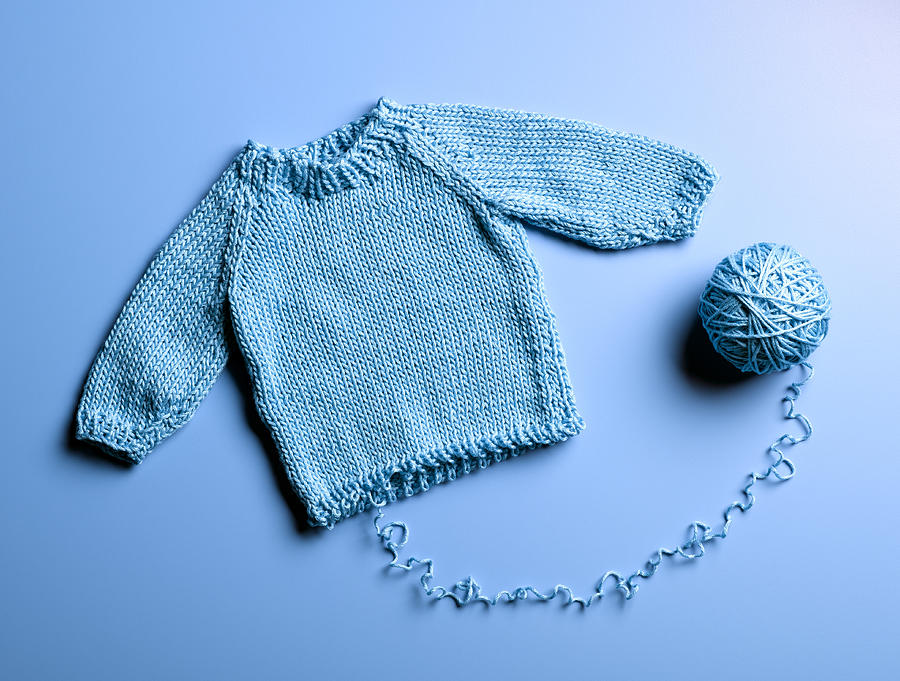 Blue Sweater Unraveling Photograph by Jeffrey Coolidge
