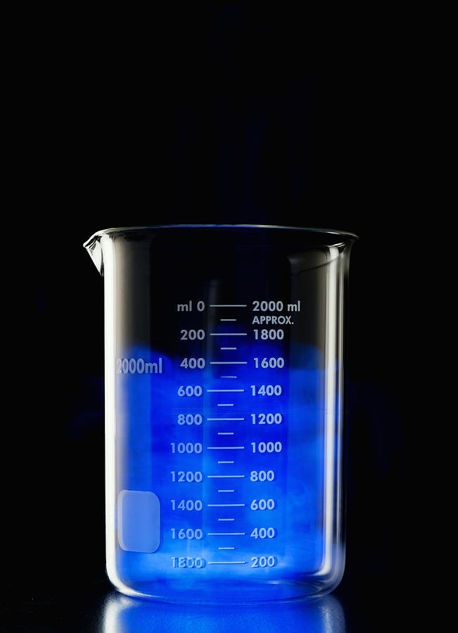 Blue Vapor In Beaker Photograph by PM Images