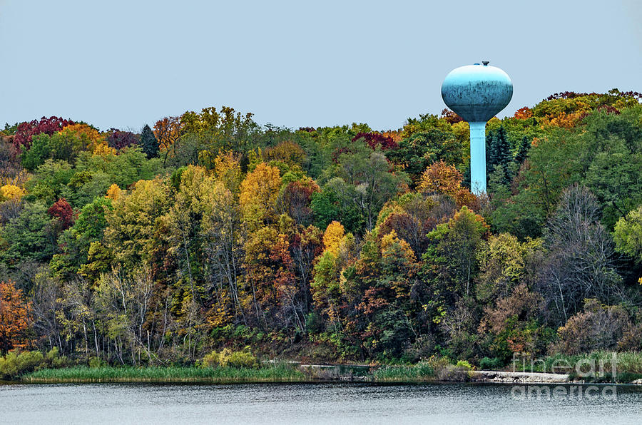 Blue Water Tower with Autumn Colors on a Lake 10254 Photograph by Sue Smith