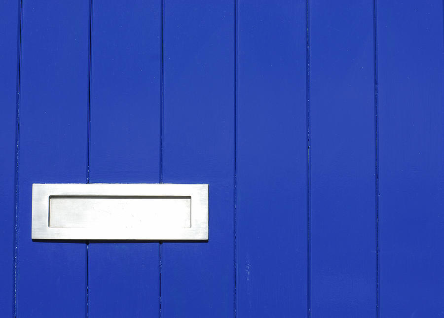 Blue wooden door with silver letterbox Photograph by Lyn Holly Coorg