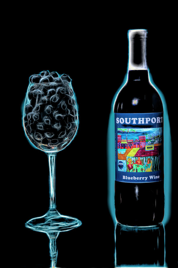 Blueberry wine in a glass Photograph by Dan Friend