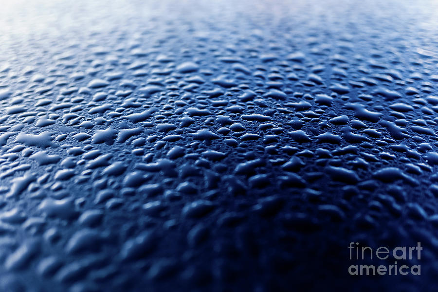 Bluish background of thick drops of water on a smooth and cool s Photograph by Joaquin Corbalan