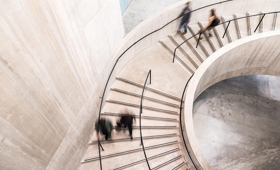 Blurred Motion of People on Spiral Staircase Photograph by Coldsnowstorm