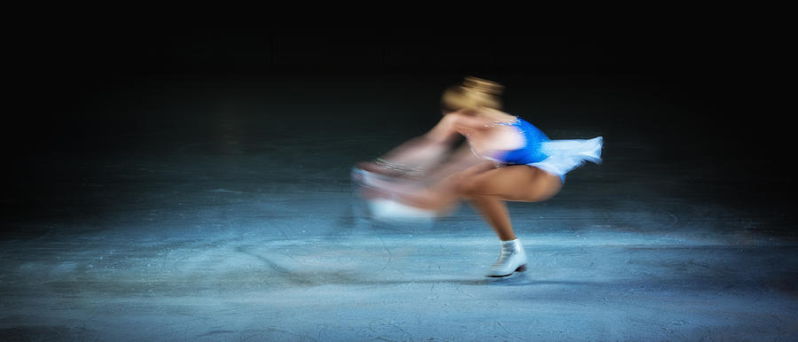 Blurred motion shot of figure female skater performing Photograph by Vm