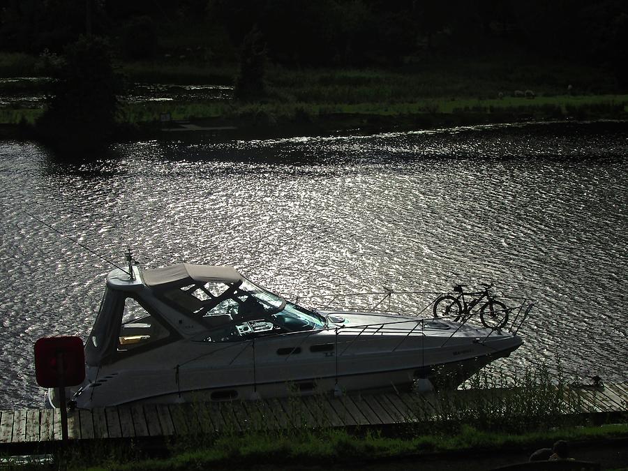 Boat and bike Photograph by Stephanie Moore