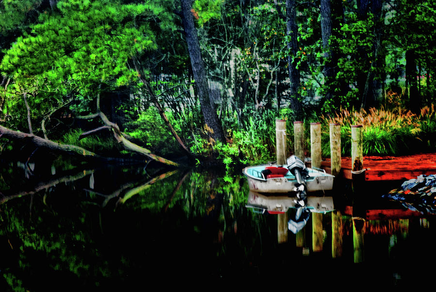 Boat at dock on the Loop Canal Photograph by Bill Jonscher