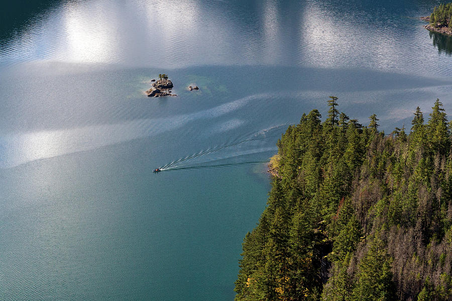 Boat Crossing Diablo Lake Photograph by Michael Russell