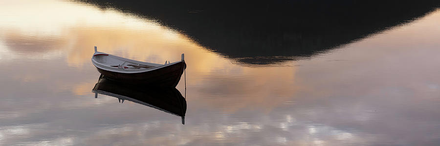 Boat in a lake Photograph by Sonny Ryse