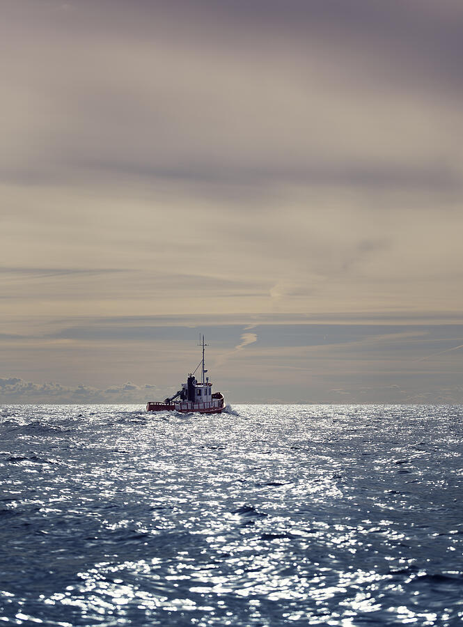 Boat in sunset Photograph by Per Mattisson Boat in sunset Photograph by Per Mattisson