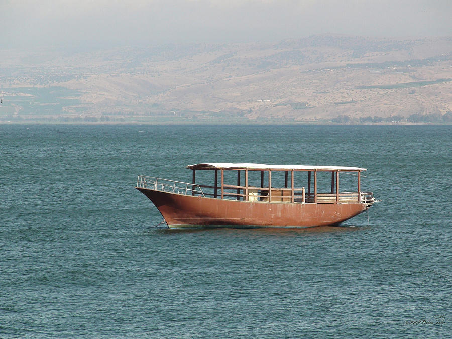 Boat on Sea of Galilee Photograph by Brian Tada