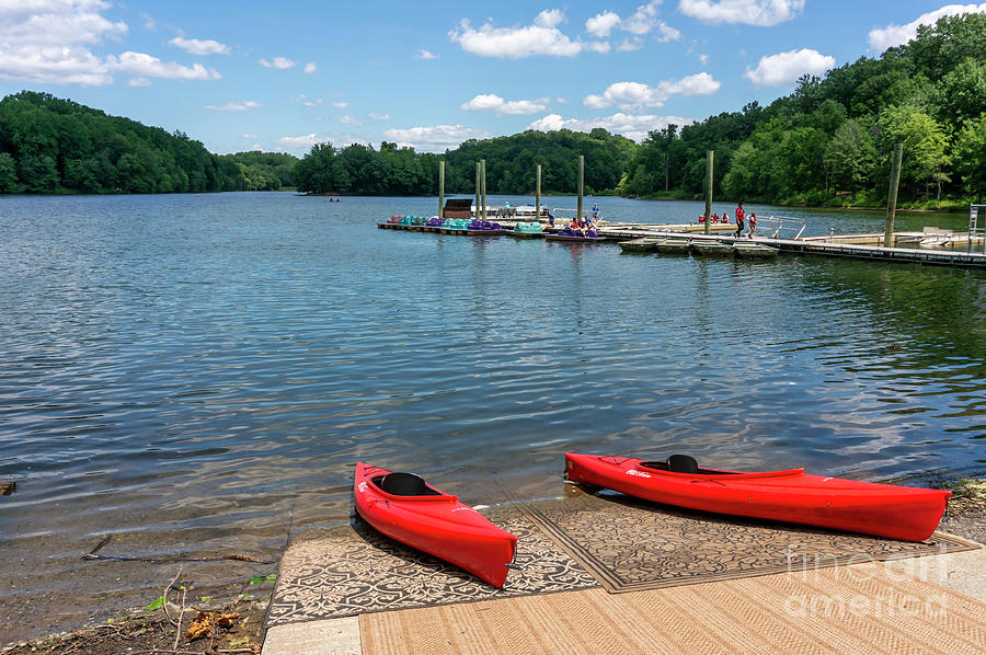 Kayaks at boat rental area at Lake Needwood Park near Rockville, Maryland  Photograph by William Kuta