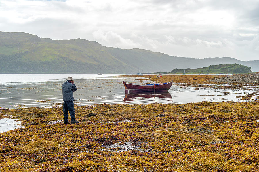 Boat Seaweed and photographer in Isle of Skye, UK Photograph by Dubi Roman