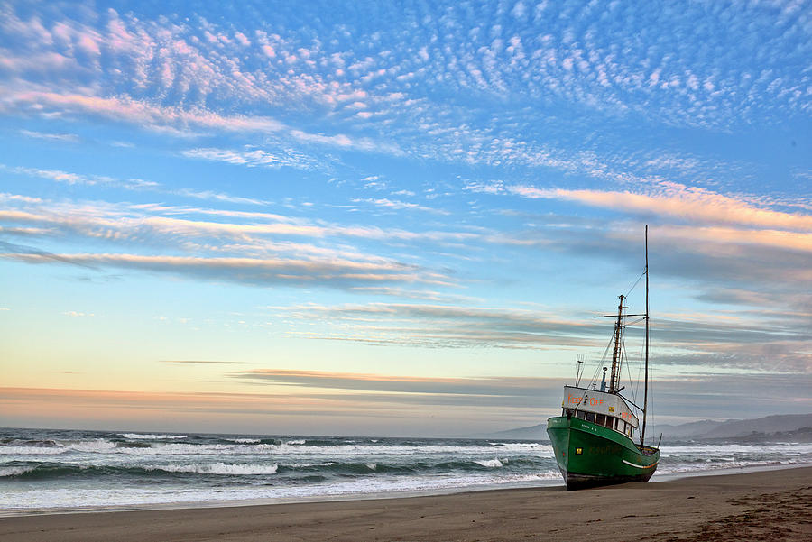Boat Stuck on a Beach Photograph by Jon Glaser