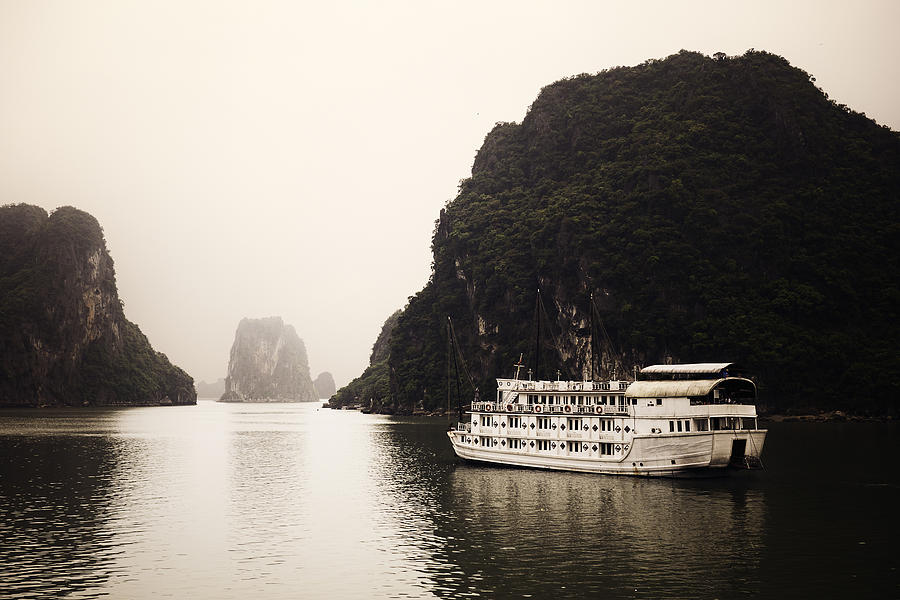 Boat Trip across Famous Halong Bay Photograph by Bernd Schunack