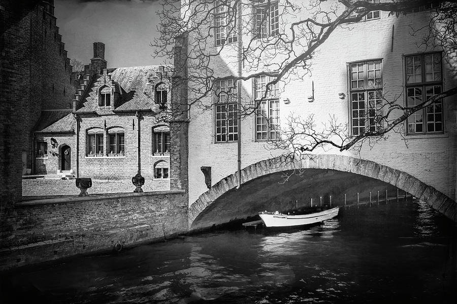 Boat Under A Little Bridge in Bruges Black and White Photograph by Carol Japp