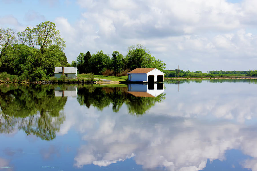 Boathouse Reflected in River on a Beautiful Day Photograph by Charles Floyd