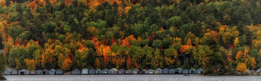 Boathouses in Autumn Photograph by Hans Brakob