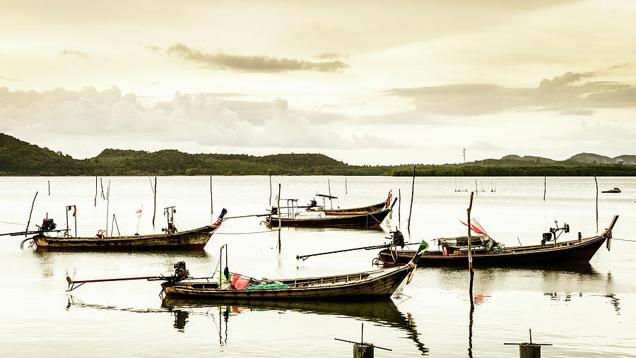 Boats at fishing village in Thailand Photograph by Alexey Stiop