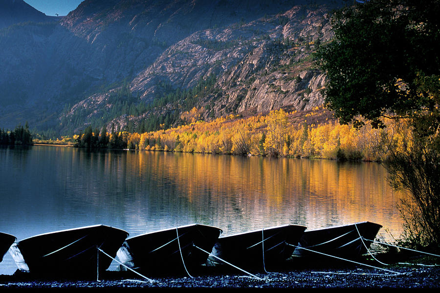 Boat Silhouettes on Silver Lake, Dawn in Autumn Photograph by Bonnie Colgan