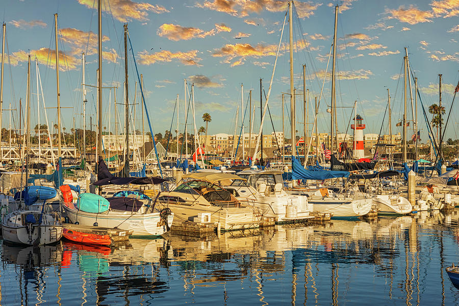Boats at the Marina with Lighthouse Photograph by Alison Frank