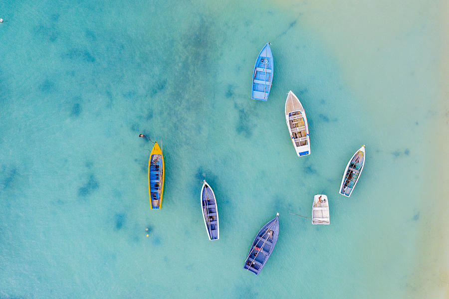 Boats in the crystal sea from above, Indian Ocean, Mauritius Photograph by Roberto Moiola / Sysaworld