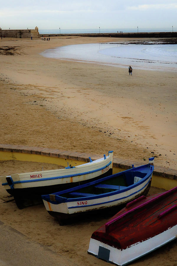 Boats on a Beach Photograph by Andrea Whitaker