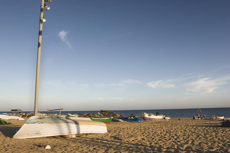 Boats on La Antilla Beach, Huelva Photograph by Silvia García