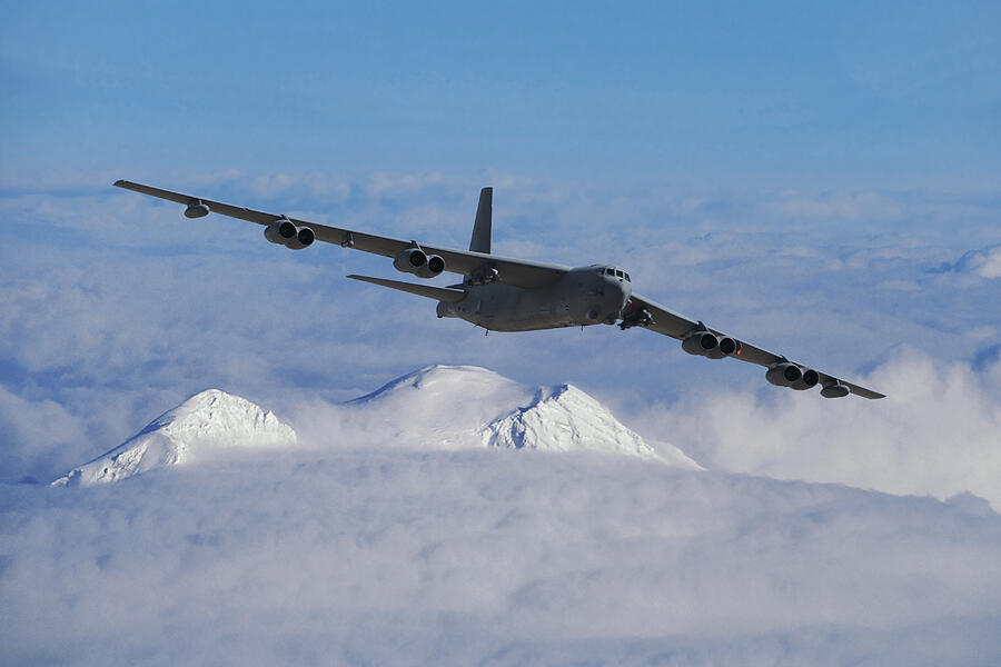 Boeing B-52H Over Snowcapped Mountains Mixed Media by Erik Simonsen